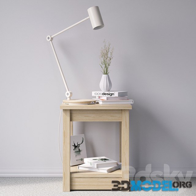 Bedside table with lamp and decor