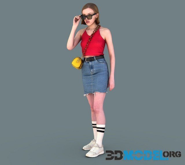 Young girl wearing denim miniskirt