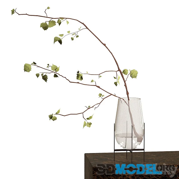 Branch in a vase pedestaled