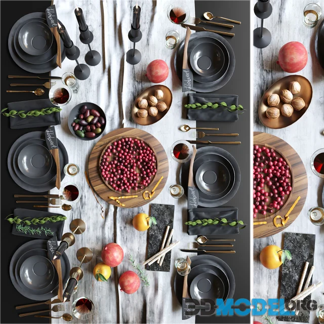 Beautiful table setting with black dishes with fruits, nuts and candlesticks. Service