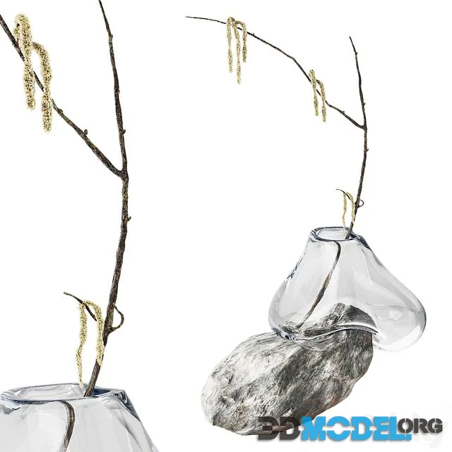 Branch with earrings in a sculpture vase by Laetitia Jacquetton