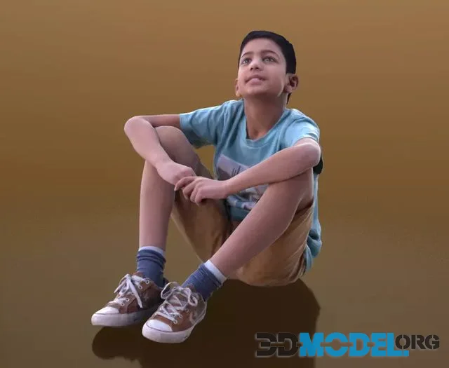 Amal boy in a sitting pose