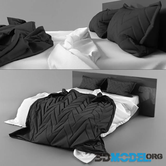 Bed with black and white bedclothes