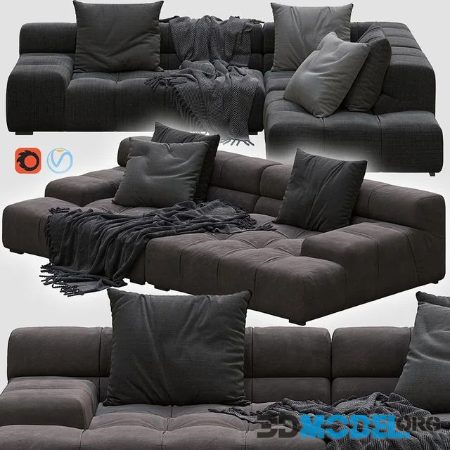 Tufty-time sofa with plaid and pillows