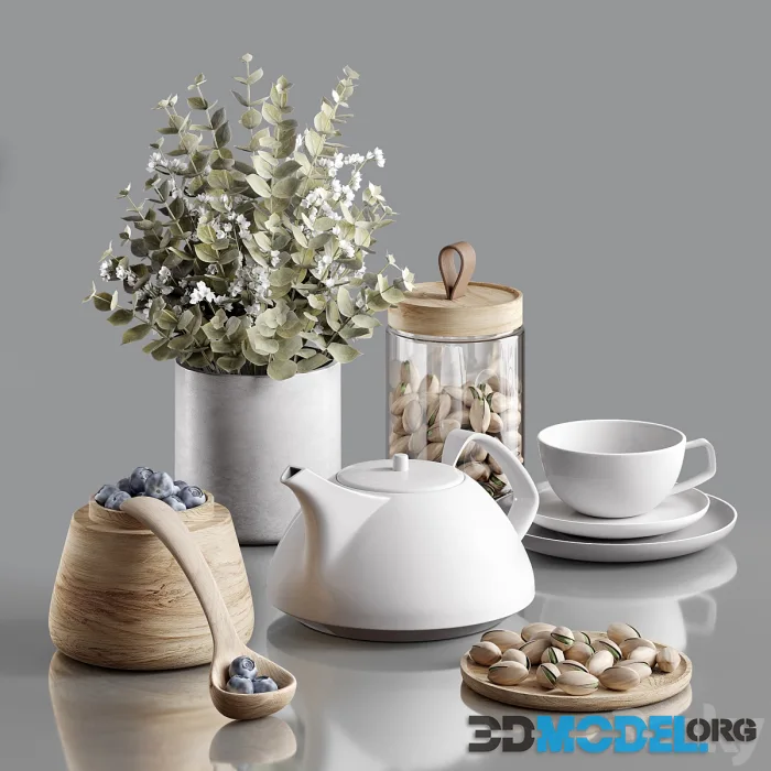 Decorative set with blueberries, pistachios and utensils