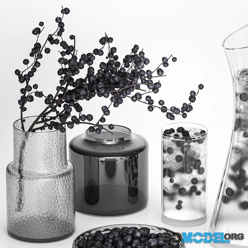 A decanter of blueberry lemonade with ice