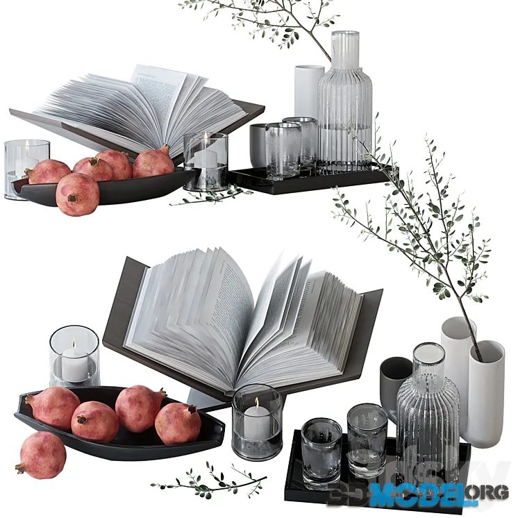Decorative set with pomegranate fruits and a book